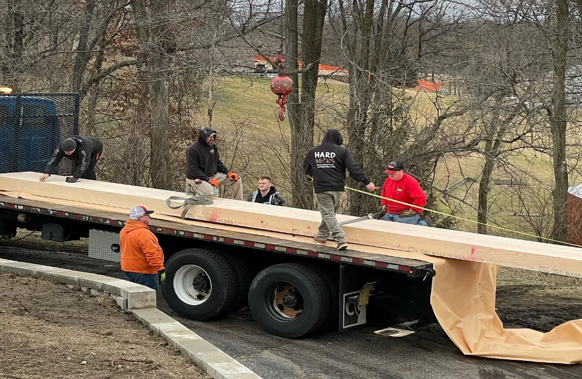 Transporting a lot of lumber on a truck - Hard Decks Transporting a lot of lumber on a truck