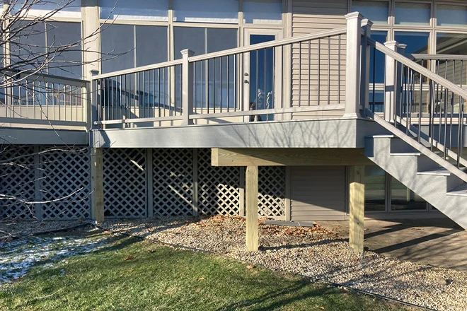 Off white railing with post caps on deck - Hard Decks Off white railing with post caps on deck