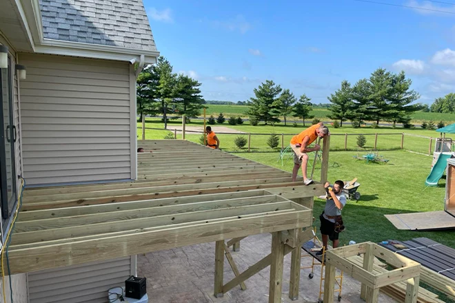 Hard Decks team installing a complex deck layout - Hard Decks Hard Decks team installing a complex deck layout