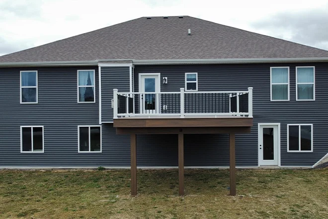 New second story deck on a blue house