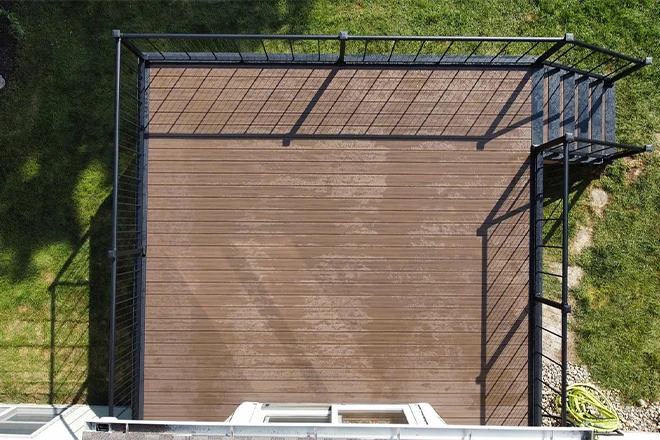 The Wood Decking Cost For Deck Construction In Belvidere, IL 6 Birds eye view of a wooden deck
