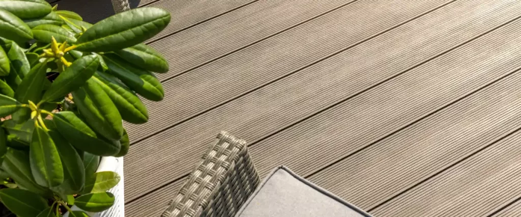 Deckorators vs. Trex: Which Deck Material Wins in 2026? 1 a patio area featuring composite decking