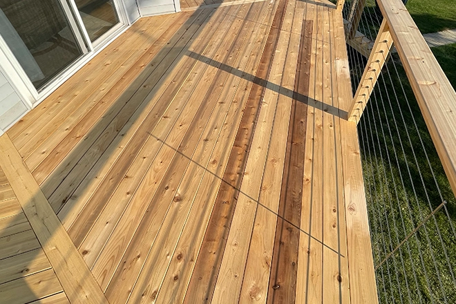Newly built deck with the correct deck board spacing