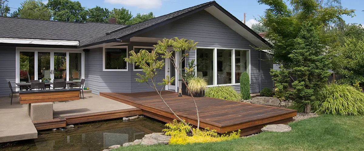 Deck Building in Rockford, IL 8 Modern wood deck extension with pond-side platform