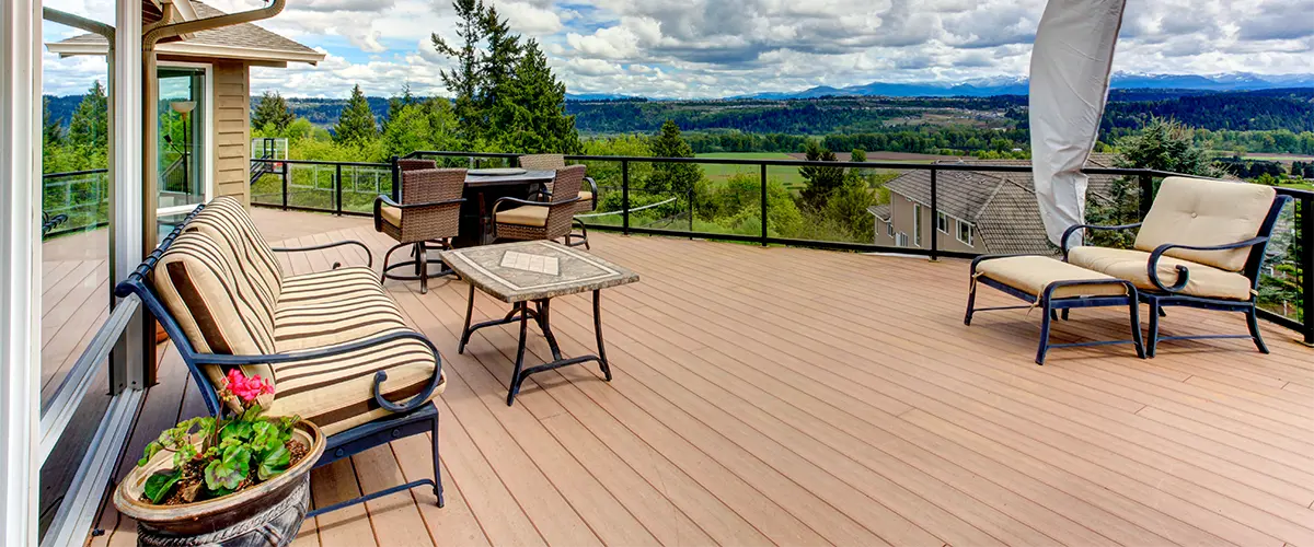Deck Replacement in Rockford, IL 2 Large deck with outdoor furniture and scenic view
